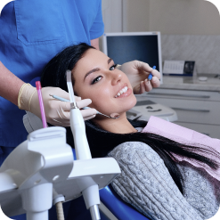 dentist-curing-female-patient-dentist-office-dentistry-care-woman-visit 1