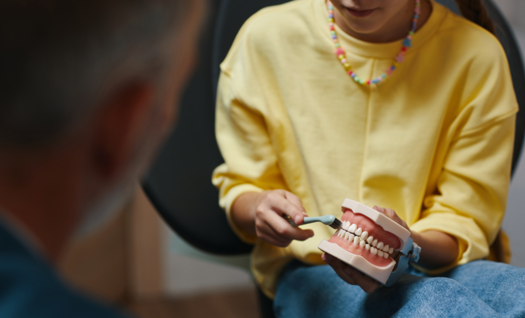 A professional shows how to properly care and clean dentures.